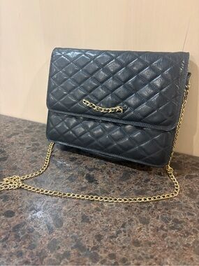 Quilted Black Leather Crossbody with Gold Chain Strap
Italian genuine leather